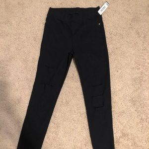 Brand new black slit skinny jeans! Petite womens M